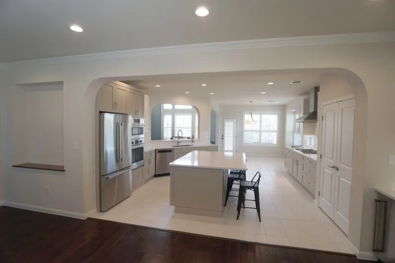 Finished kitchen remodel with quartz island in Austin, TX