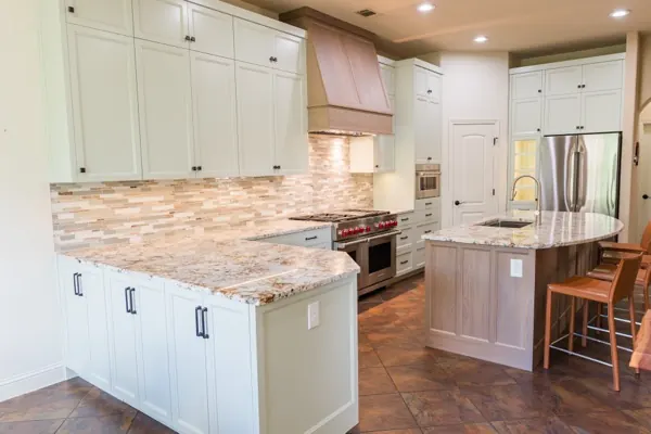 Custom kitchen remodel with wood range hood in Austin, TX