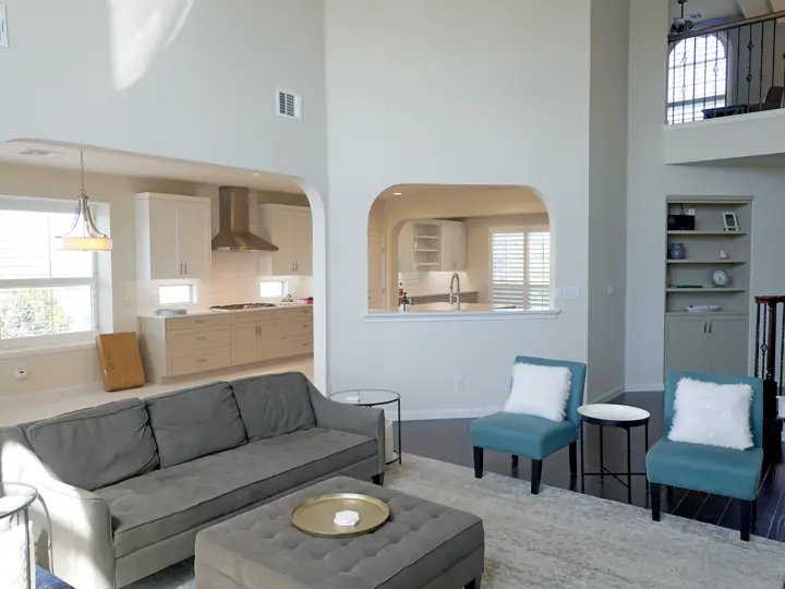 Living room and kitchen after an open-concept remodel