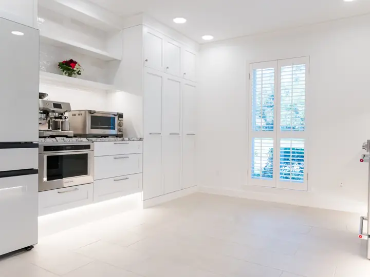 White accessible kitchen with cooking station at seated height